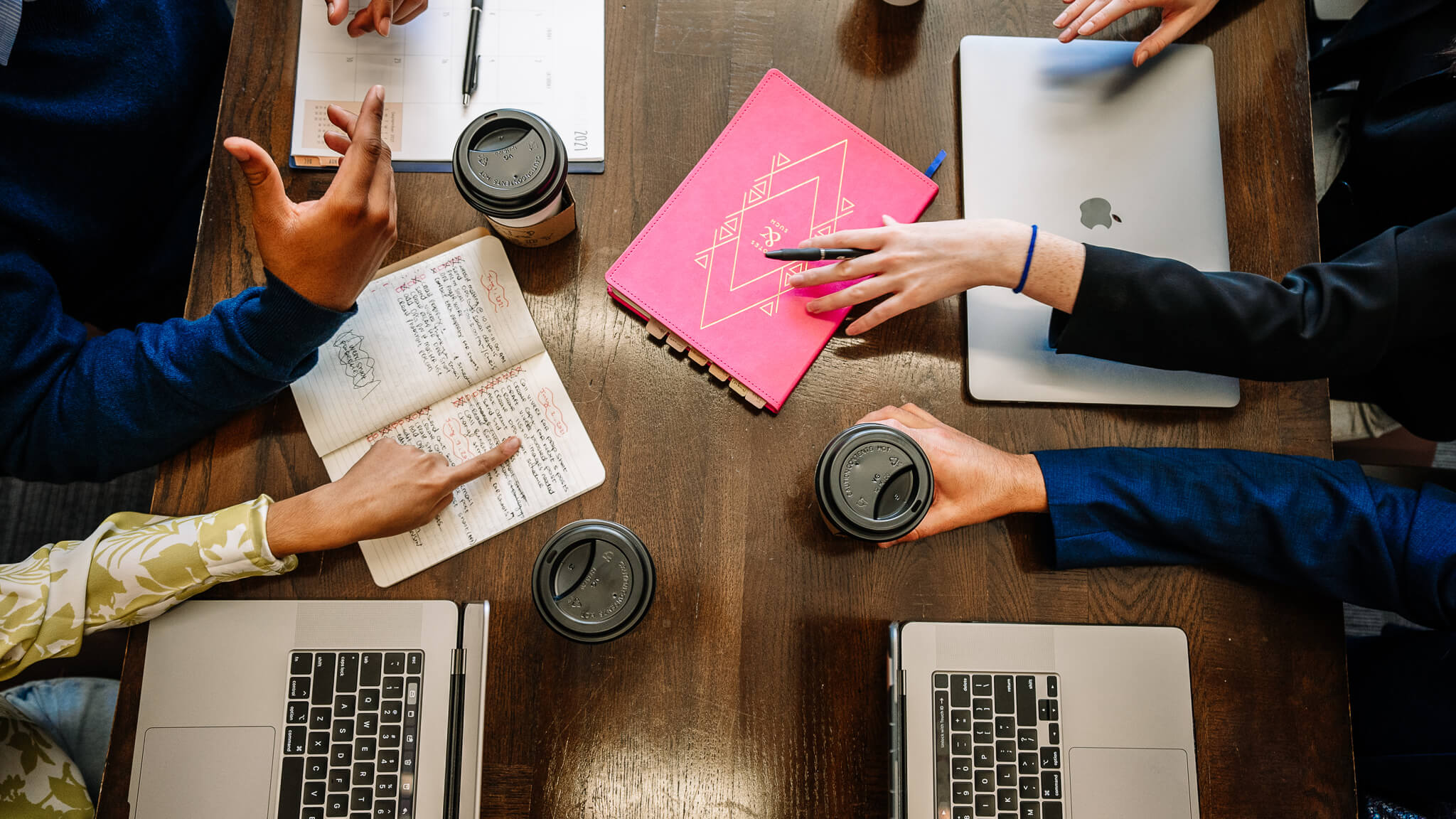 group of people working at a desk
